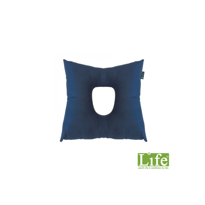 Cuscino con foro centrale in fibra cava siliconata: prevenzione del decubito