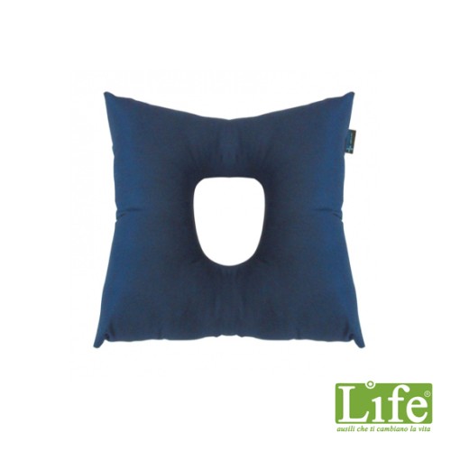 Cuscino con foro centrale in fibra cava siliconata: prevenzione del decubito